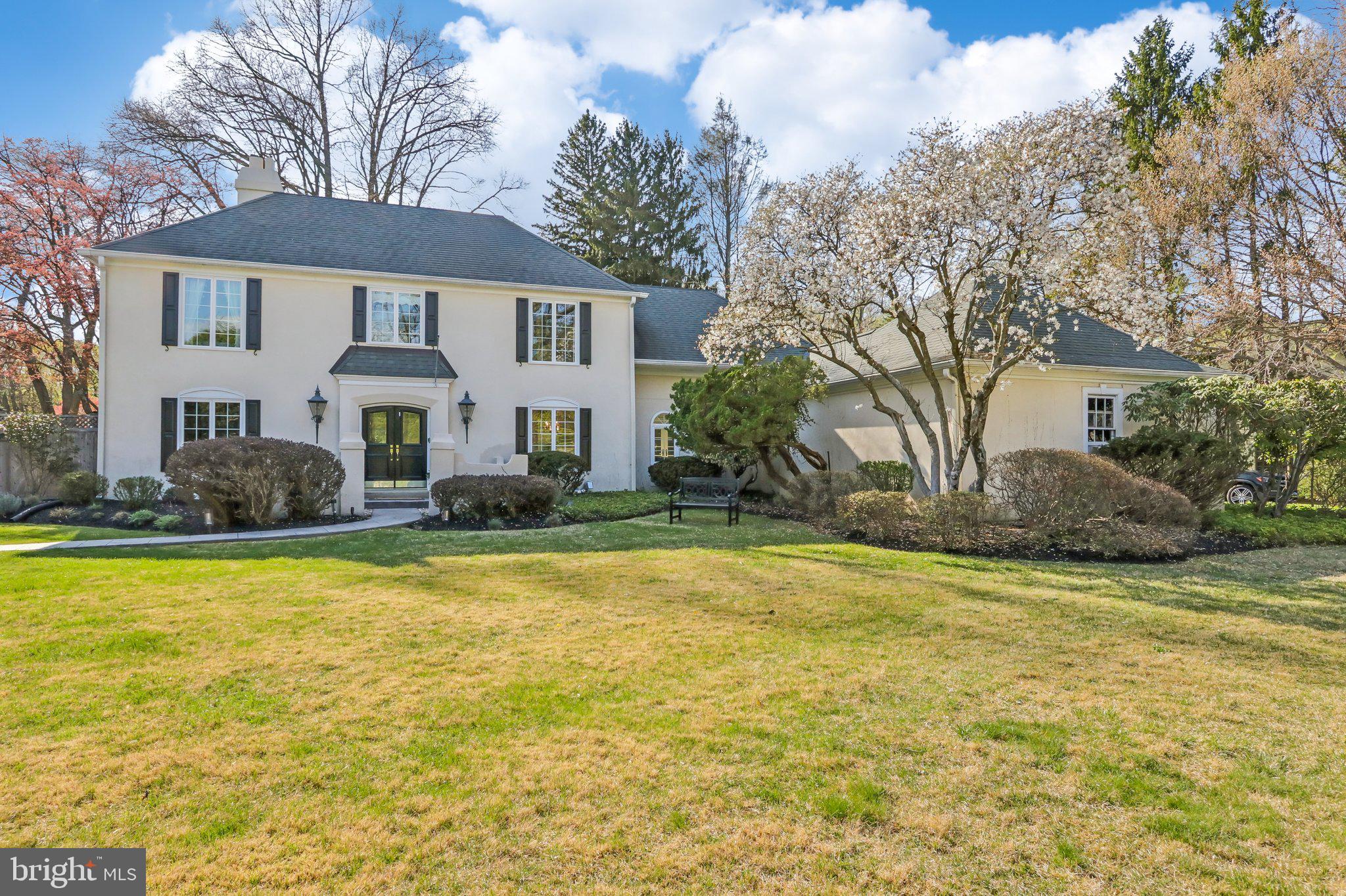 410 North Valley Forge Road Devon, PA 19333 - Photo 2 of 84 a front view of a house with swimming pool and porch
