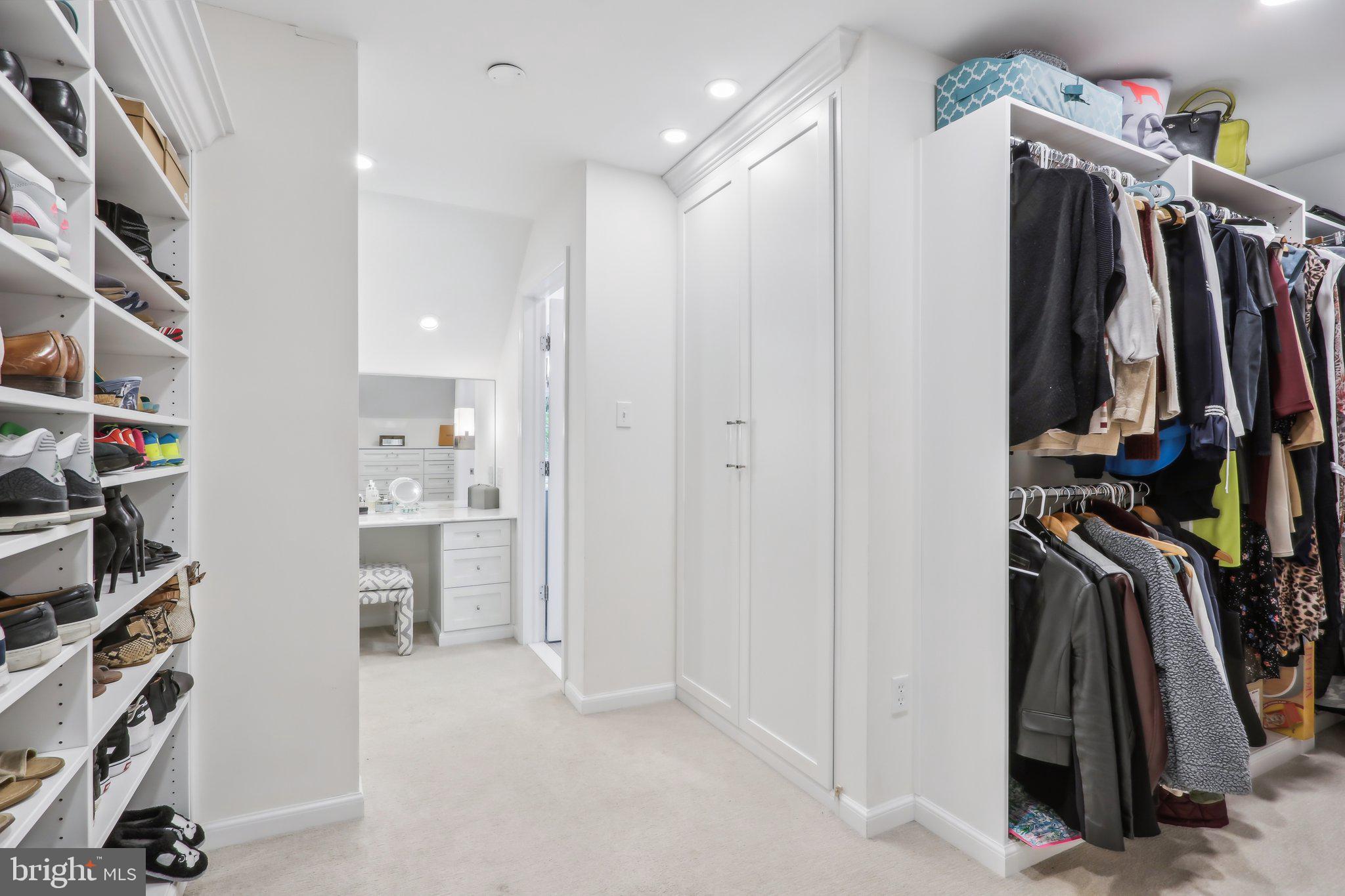 410 North Valley Forge Road Devon, PA 19333 - Photo 41 of 84 a view of walk in closet with clothes and shoes