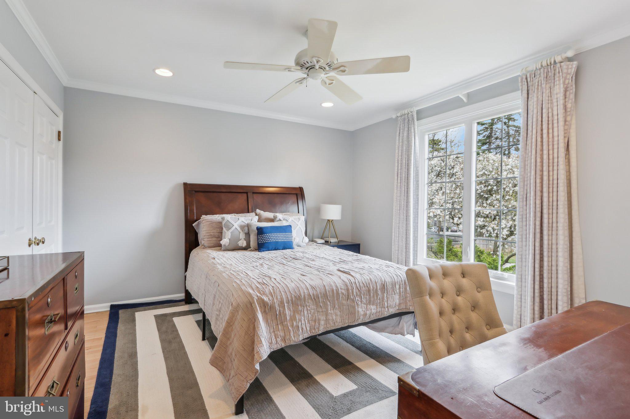 410 North Valley Forge Road Devon, PA 19333 - Photo 51 of 84 a bedroom with a bed and wooden floor