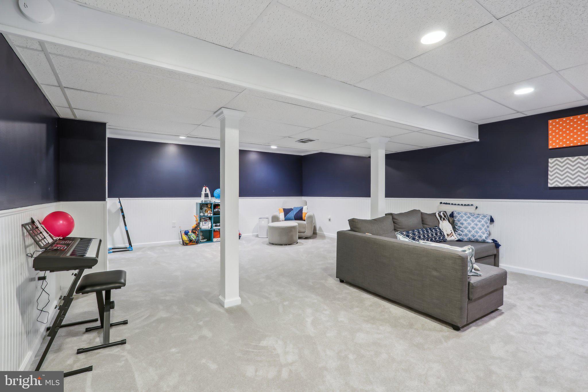 410 North Valley Forge Road Devon, PA 19333 - Photo 58 of 84 a living room with furniture and kitchen view