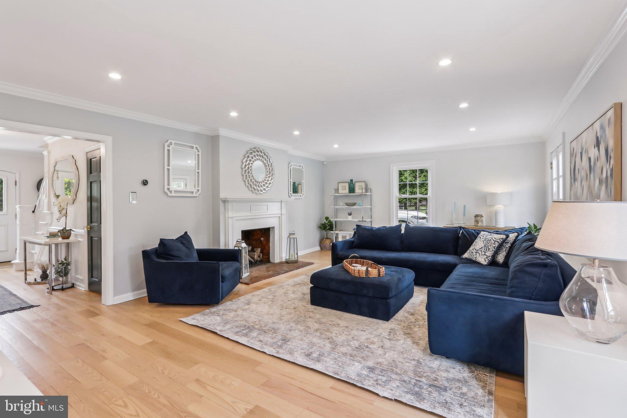 410 North Valley Forge Road Devon, PA 19333 - Photo 6 of 84 a living room with furniture or couch and a fireplace