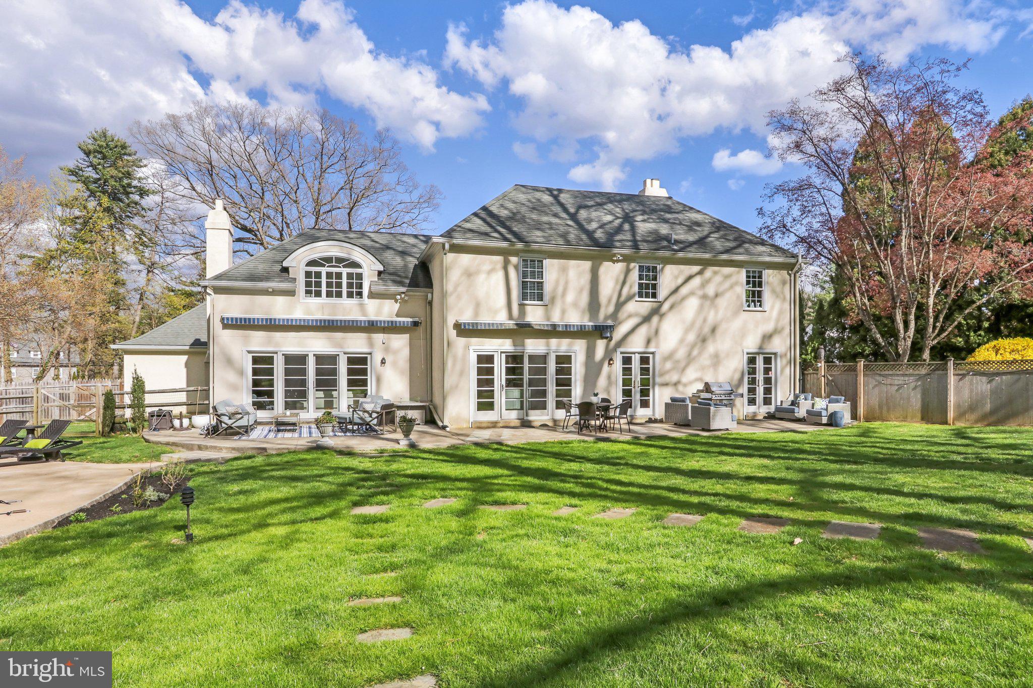 410 North Valley Forge Road Devon, PA 19333 - Photo 63 of 84 a view of a building with a big yard and large trees