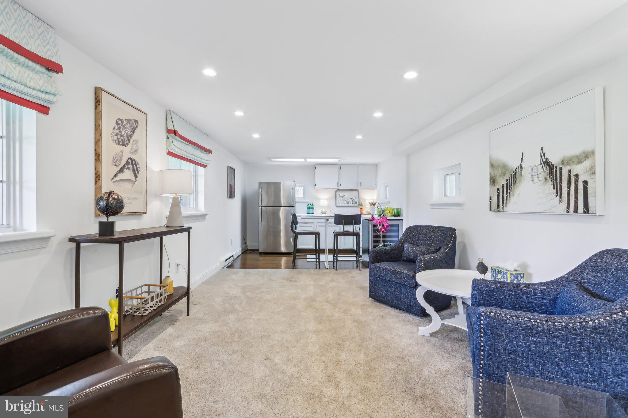 410 North Valley Forge Road Devon, PA 19333 - Photo 66 of 84 a living room with furniture and a flat screen tv