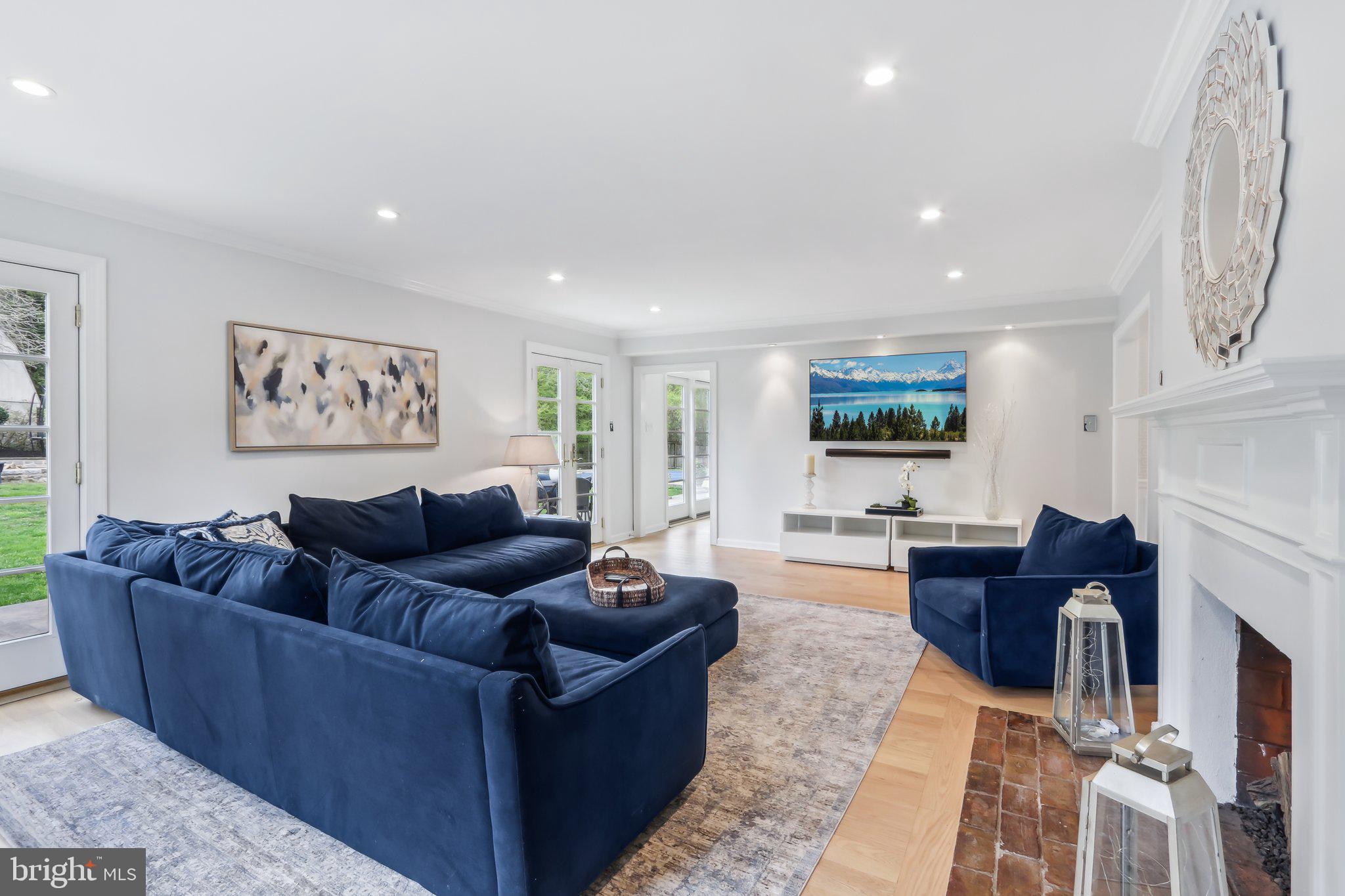410 North Valley Forge Road Devon, PA 19333 - Photo 7 of 84 a living room with furniture and a flat screen tv