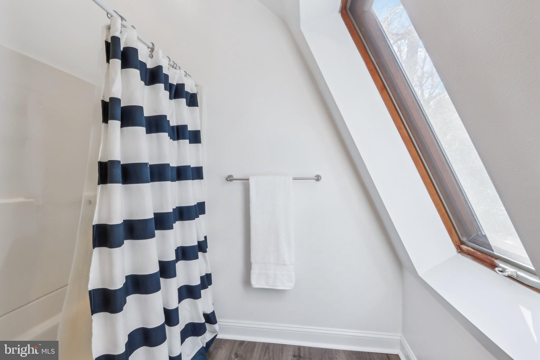410 North Valley Forge Road Devon, PA 19333 - Photo 74 of 84 a view of a bathroom with a black and white checkered floor