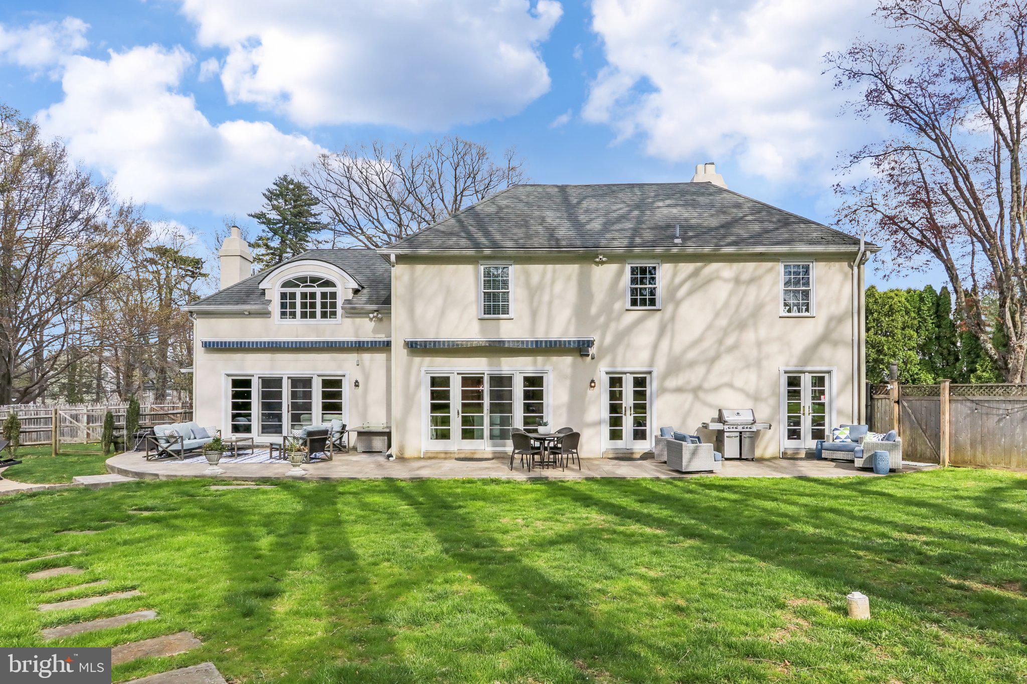 410 North Valley Forge Road Devon, PA 19333 - Photo 75 of 84 a front view of a house with a garden and trees