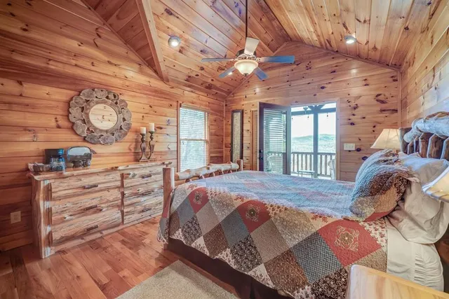 a view of a chair and table in the balcony