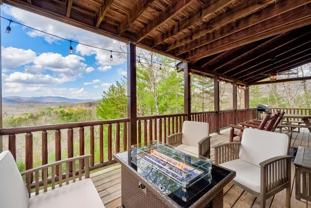 a kitchen with stainless steel appliances a sink stove and cabinets
