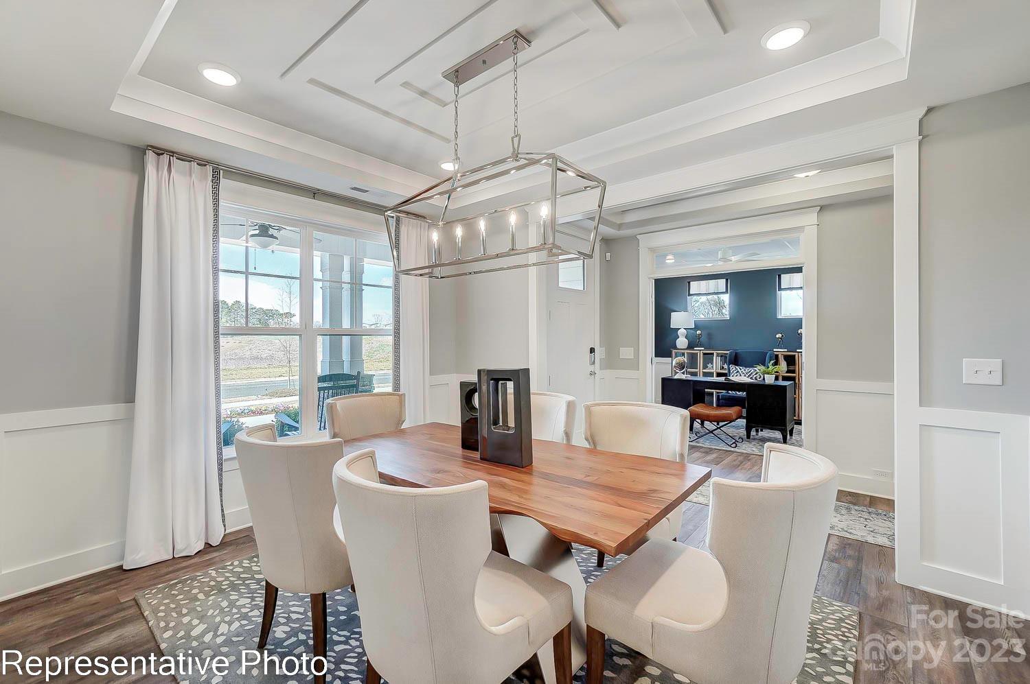4185 Roberta Road Harrisburg, NC 28075 - Photo 19 of 48 a view of a dining room with furniture window and outside view