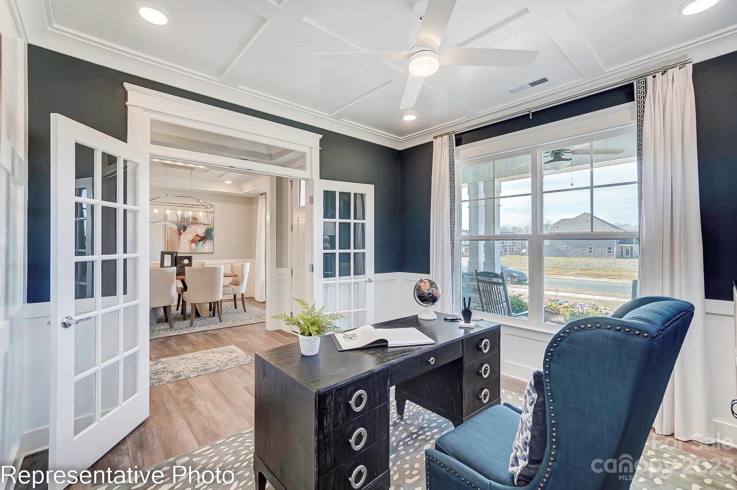 4185 Roberta Road Harrisburg, NC 28075 - Photo 23 of 48 a view of a dining room with furniture window and outside view