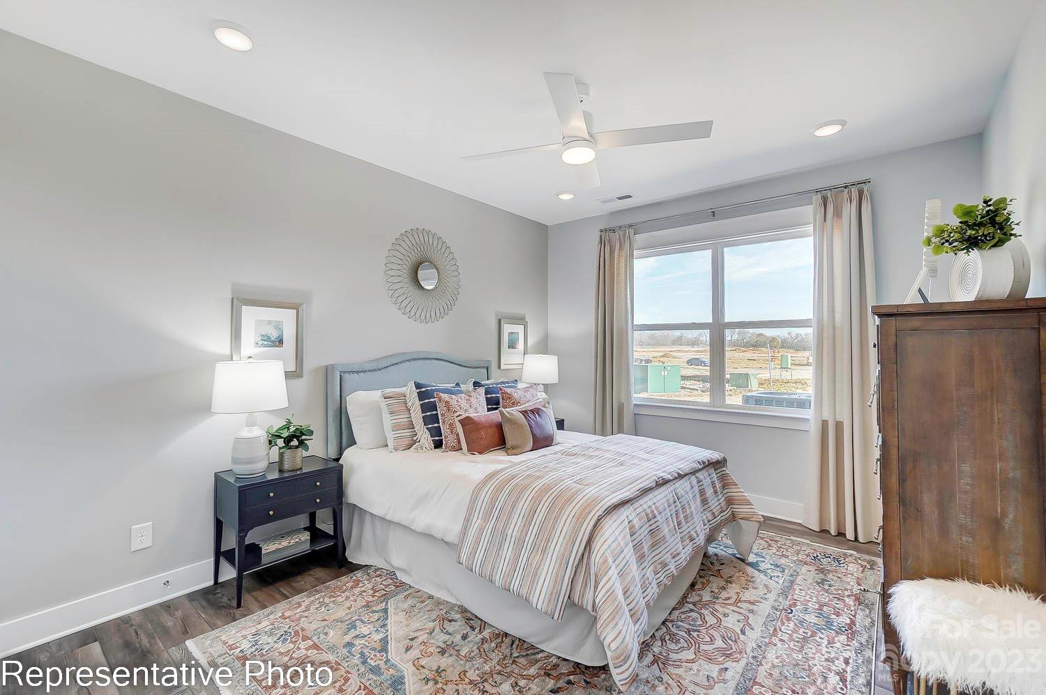 4185 Roberta Road Harrisburg, NC 28075 - Photo 24 of 48 a bedroom with a bed and a window