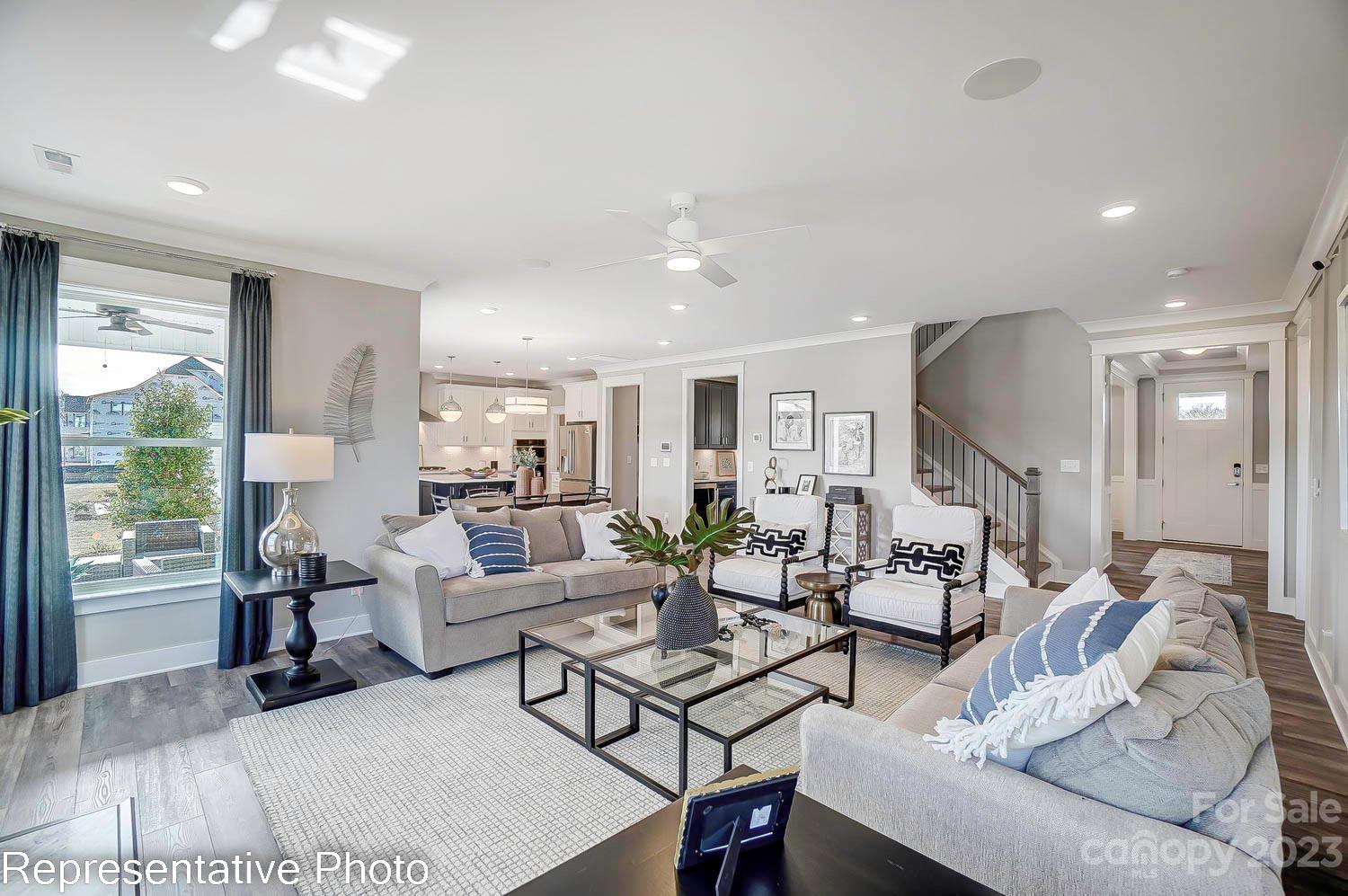 4185 Roberta Road Harrisburg, NC 28075 - Photo 3 of 48 a living room with furniture and a large window