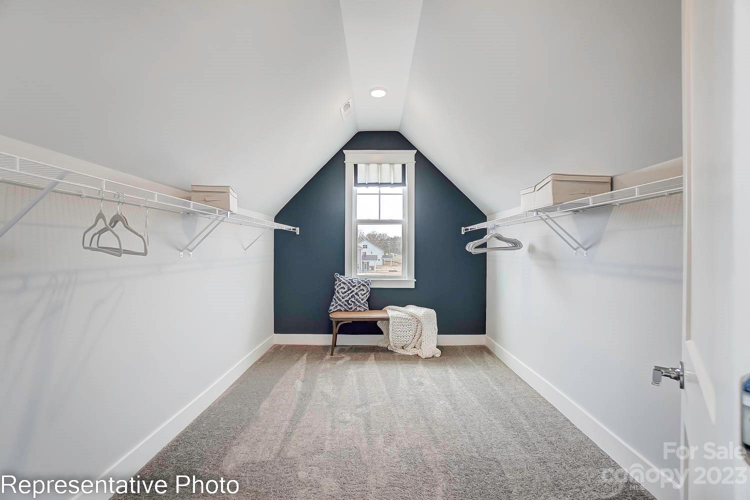 4185 Roberta Road Harrisburg, NC 28075 - Photo 31 of 48 a bedroom with a bed and window
