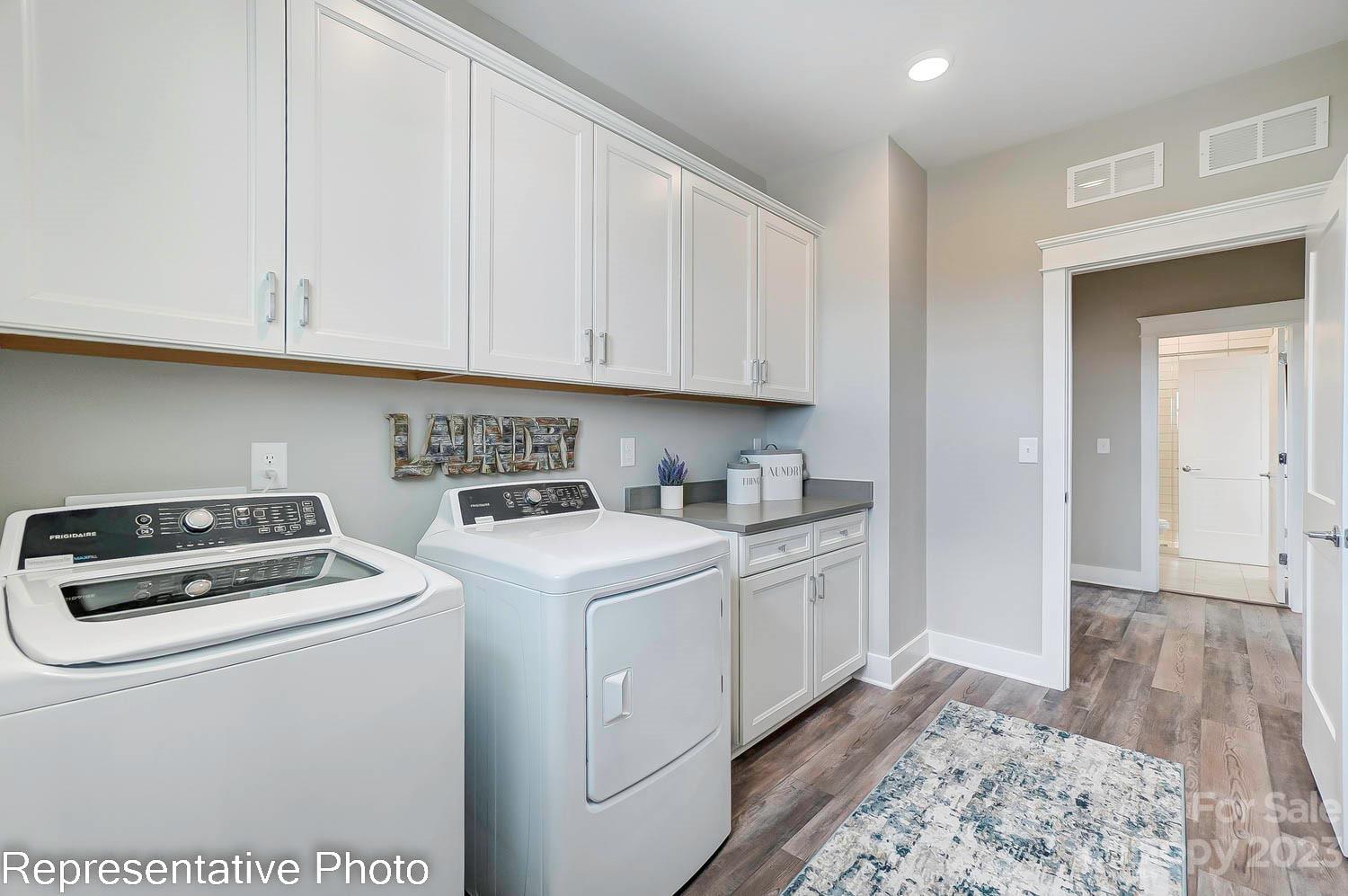 4185 Roberta Road Harrisburg, NC 28075 - Photo 48 of 48 a utility room with dryer and washer