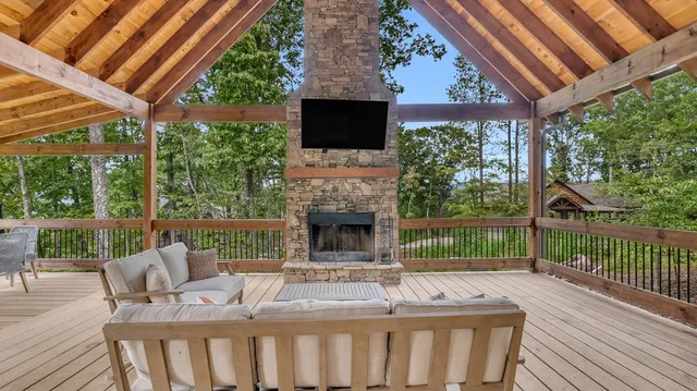 a view of a kitchen with granite countertop a sink and a wooden floor