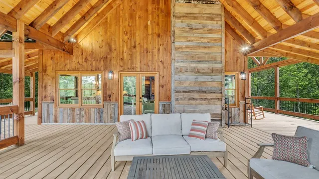 a kitchen with granite countertop a sink a stove and cabinets