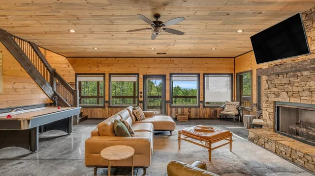 a view of a lush green outdoor space with a houses