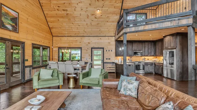 a living room with fireplace furniture and a flat screen tv