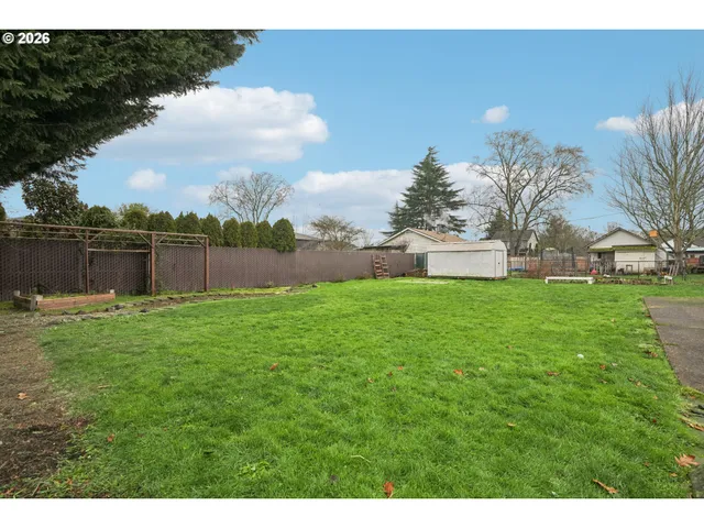 a house view with a garden space