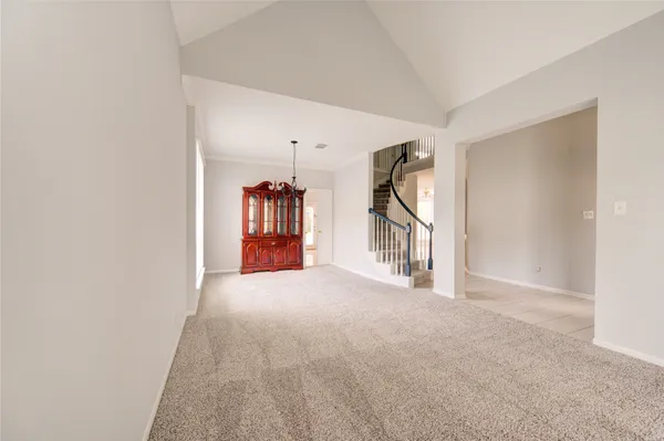 a view of empty room with front door