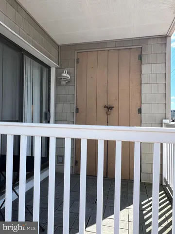 a bed room with a bed and a chandelier
