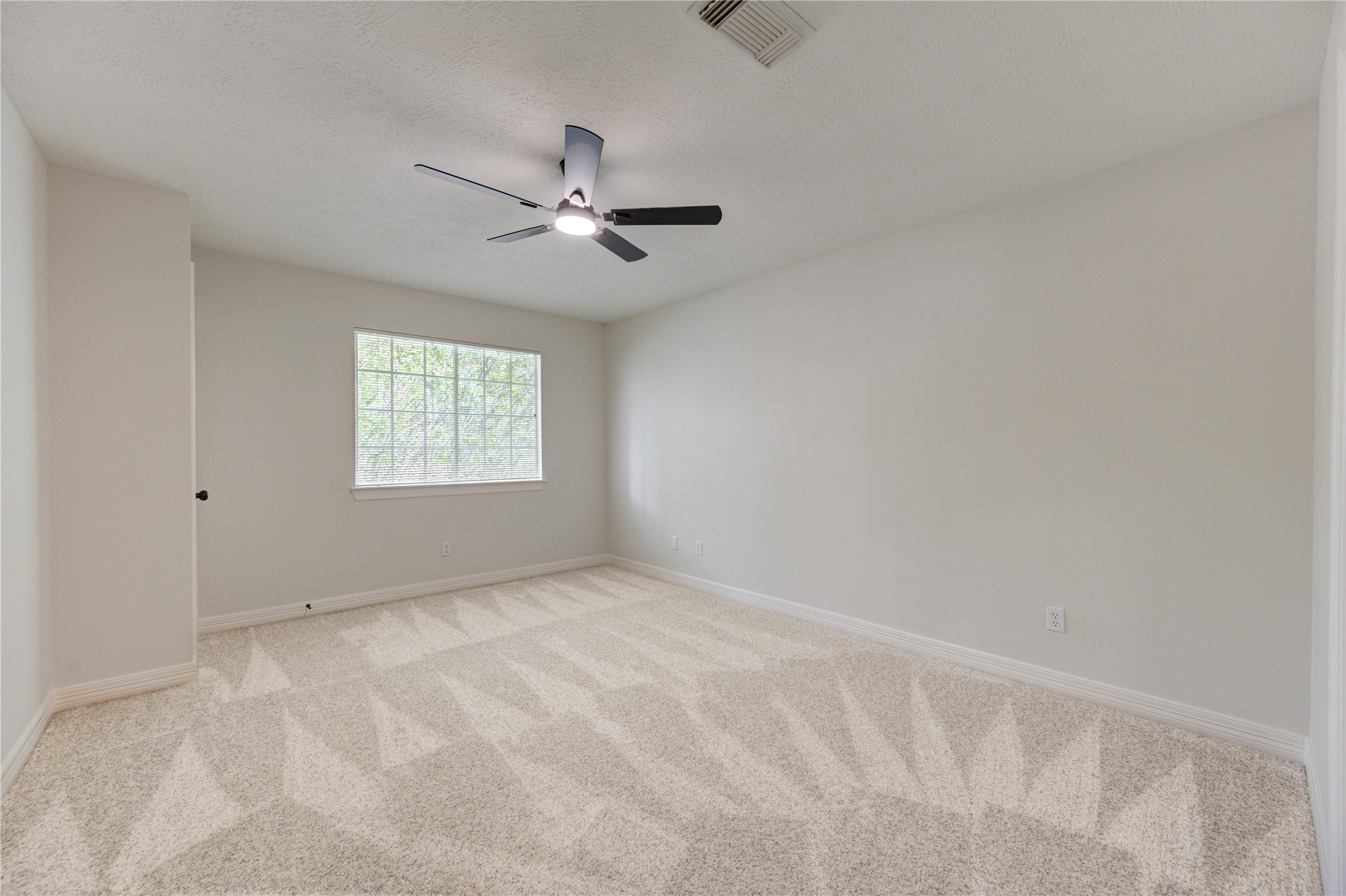 17318 Bonnard Circle Spring, TX 77379 - Photo 36 of 45 Bedroom 5 - All bedrooms have remote-controlled ceiling fans, 2-in blinds, new carpet and padding, new paint and high ceilings.