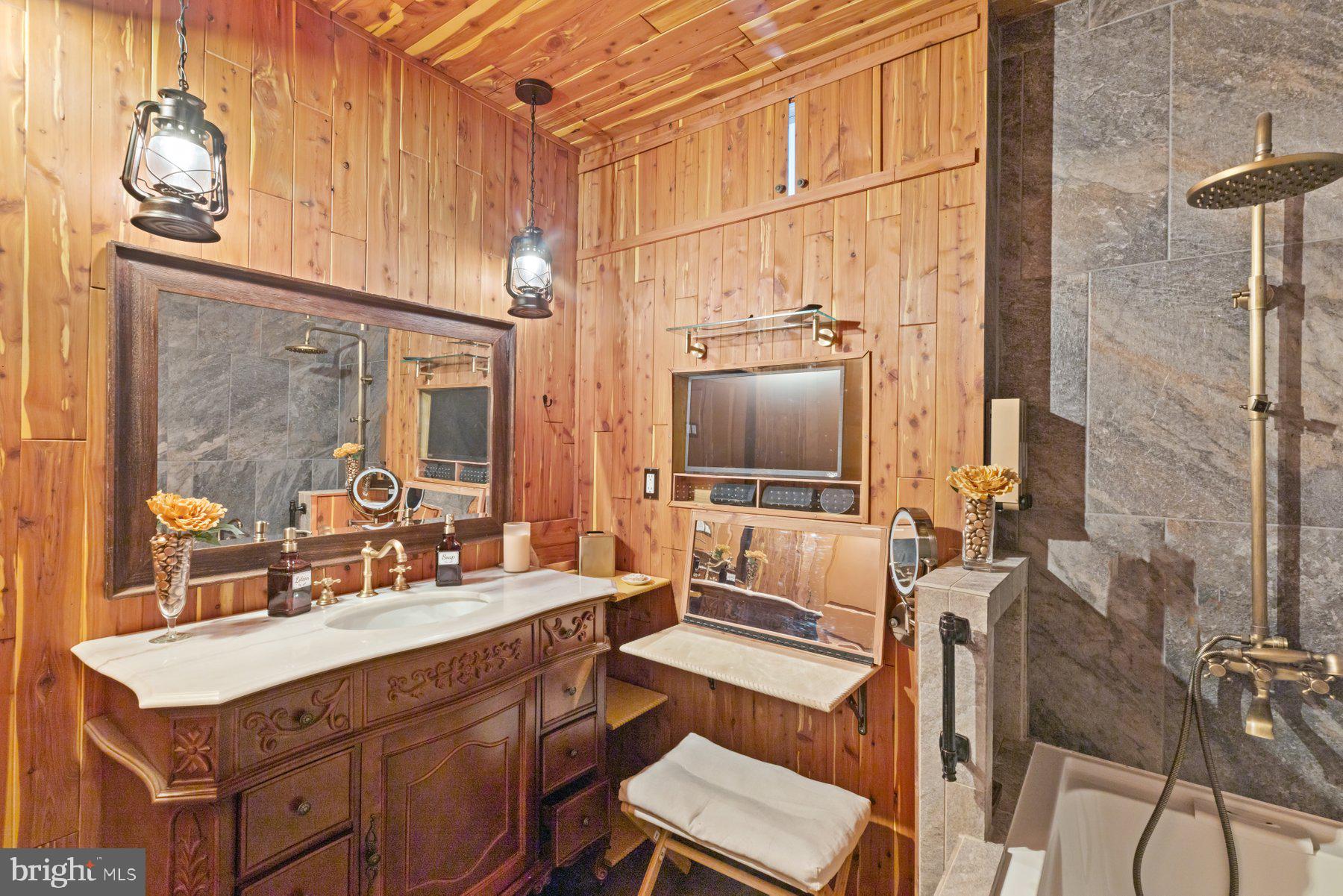 13033 Bottom Road Hydes, MD 21082 - Photo 18 of 45 a spacious bathroom with a sink double vanity and a mirror