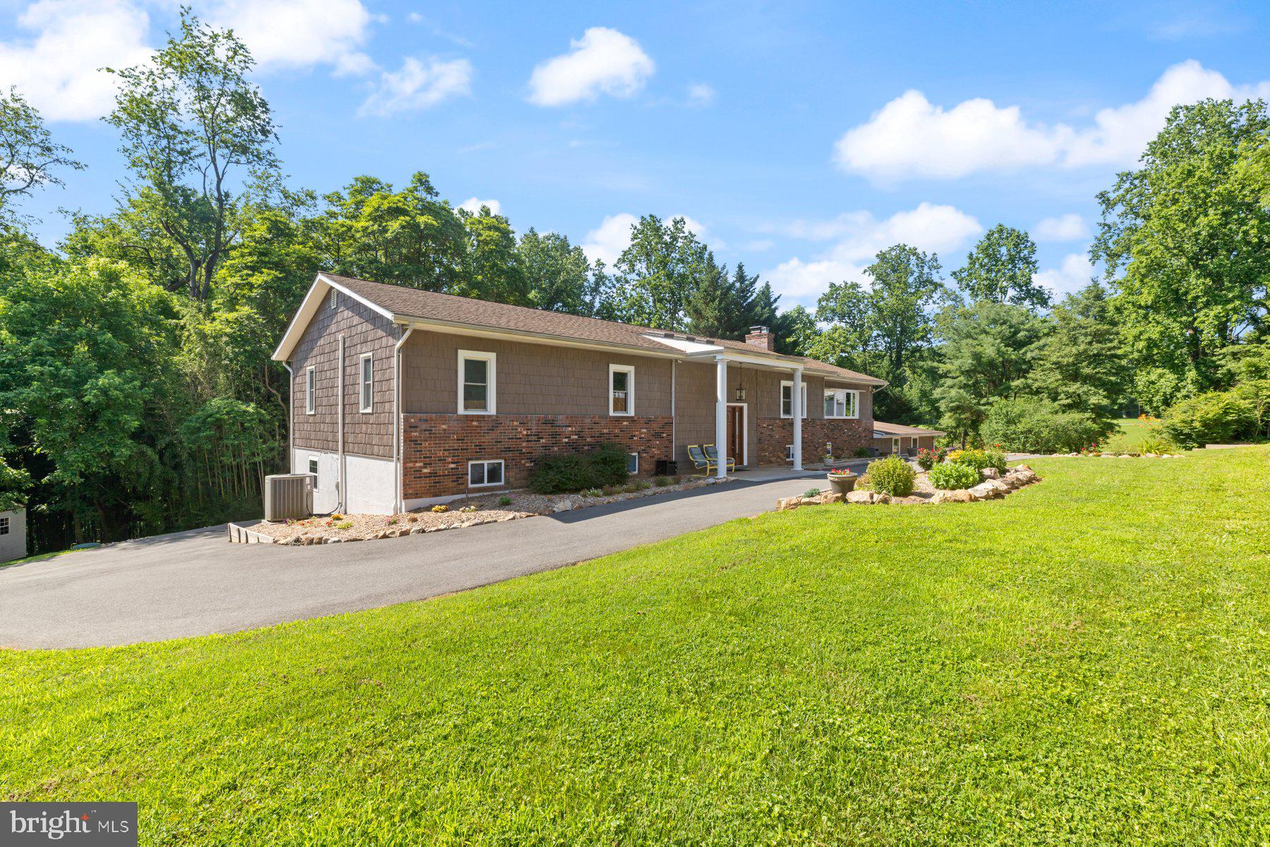 13033 Bottom Road Hydes, MD 21082 - Photo 2 of 45 a view of a house with backyard and sitting area