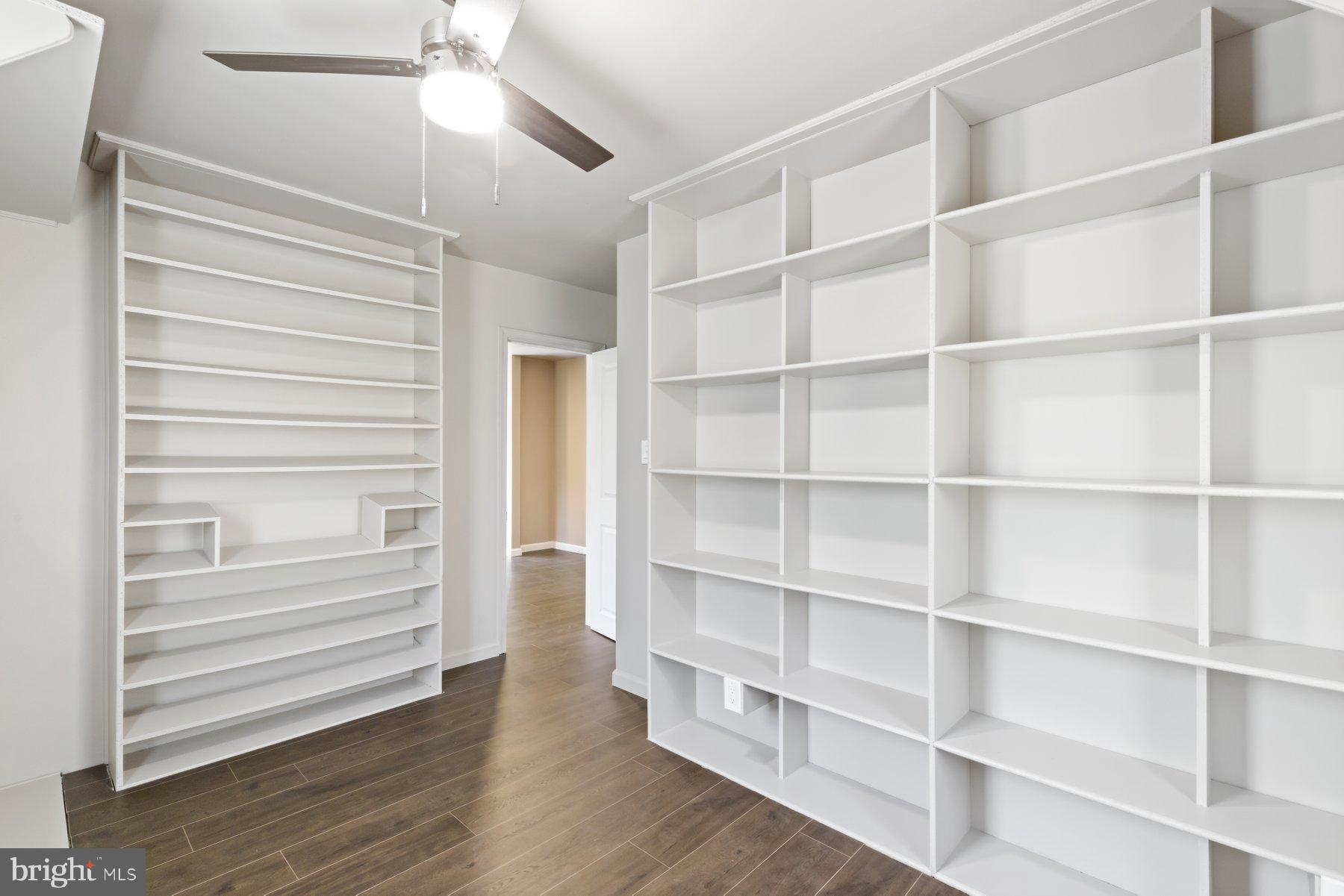 13033 Bottom Road Hydes, MD 21082 - Photo 23 of 45 a view of walk in closet with empty racks