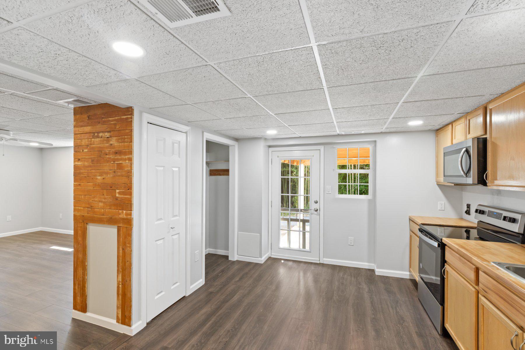 13033 Bottom Road Hydes, MD 21082 - Photo 26 of 45 a view of a kitchen with furniture and wooden floor