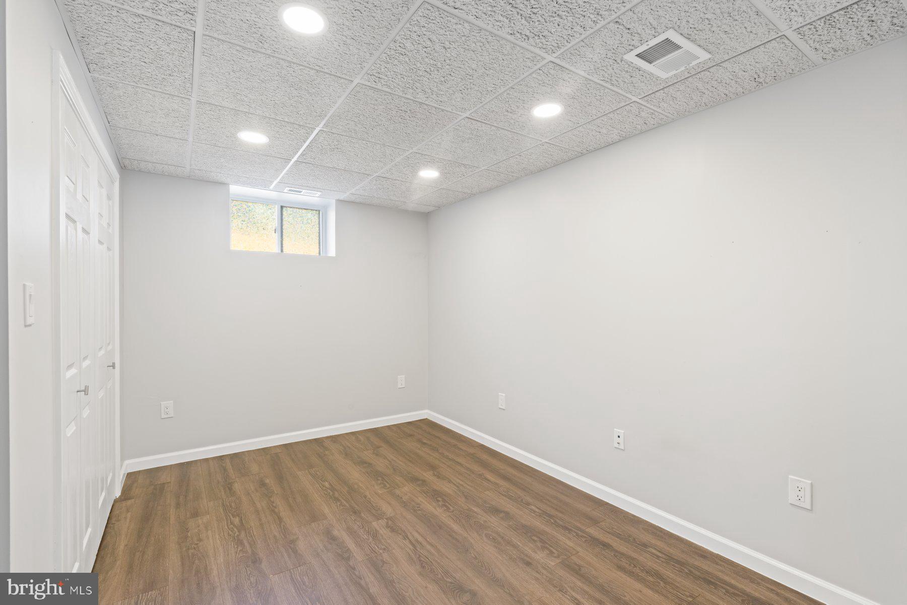 13033 Bottom Road Hydes, MD 21082 - Photo 29 of 45 a view of empty room with wooden floor