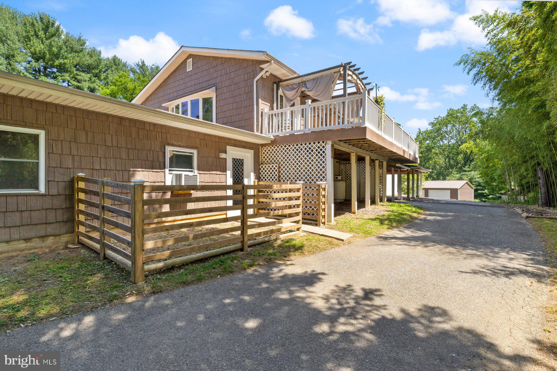 13033 Bottom Road Hydes, MD 21082 - Photo 42 of 45 a front view of a house with a yard