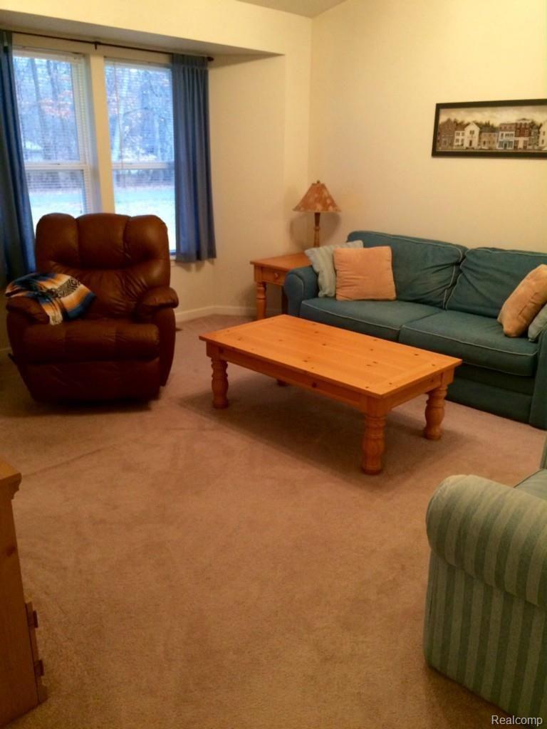 4312 Adams Road Stockbridge, MI 49285 - Photo 10 of 24 Living Room with Bay Window