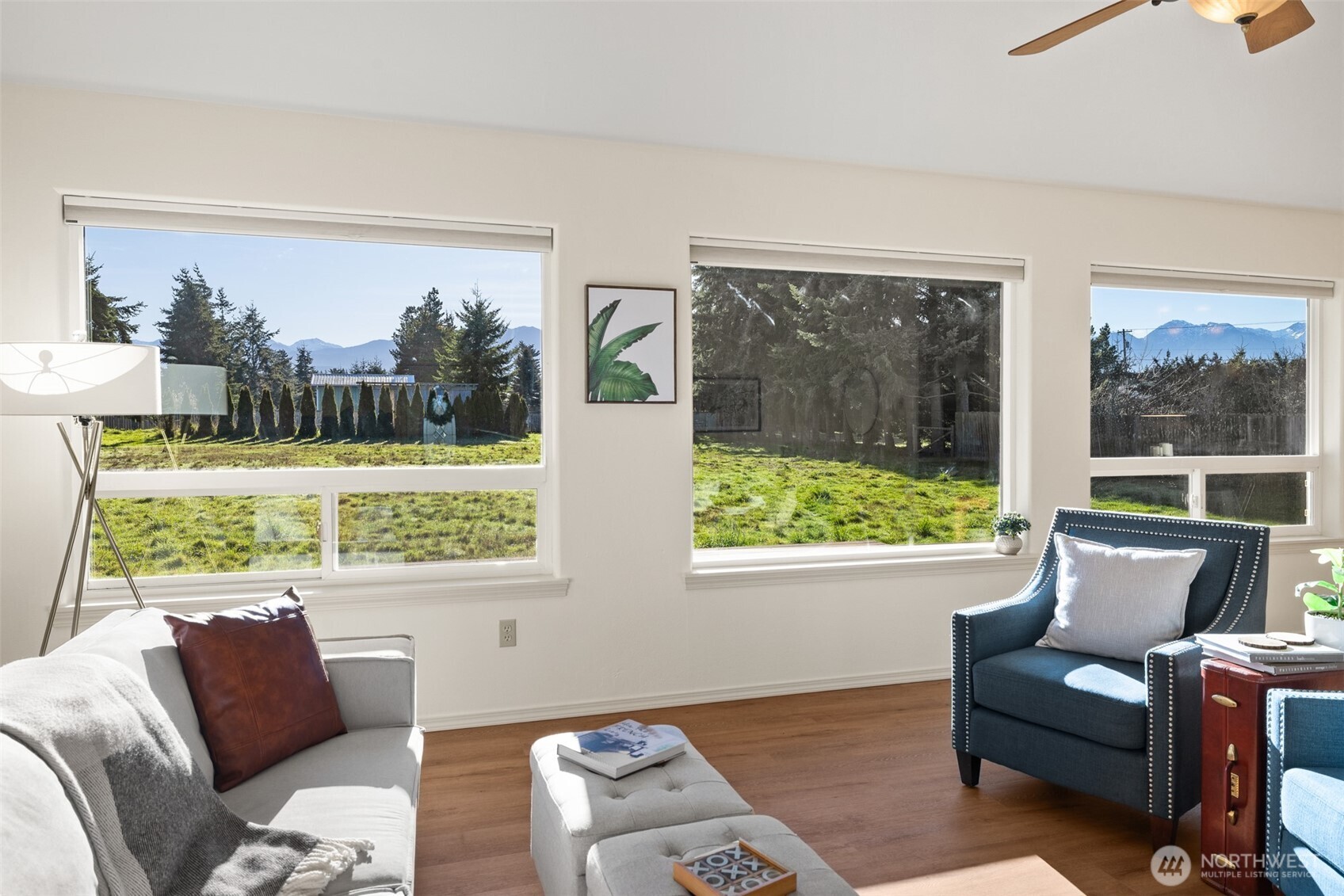 2042 Finn Hall Road Port Angeles, WA 98362 - Photo 11 of 40 a living room with furniture and a large window