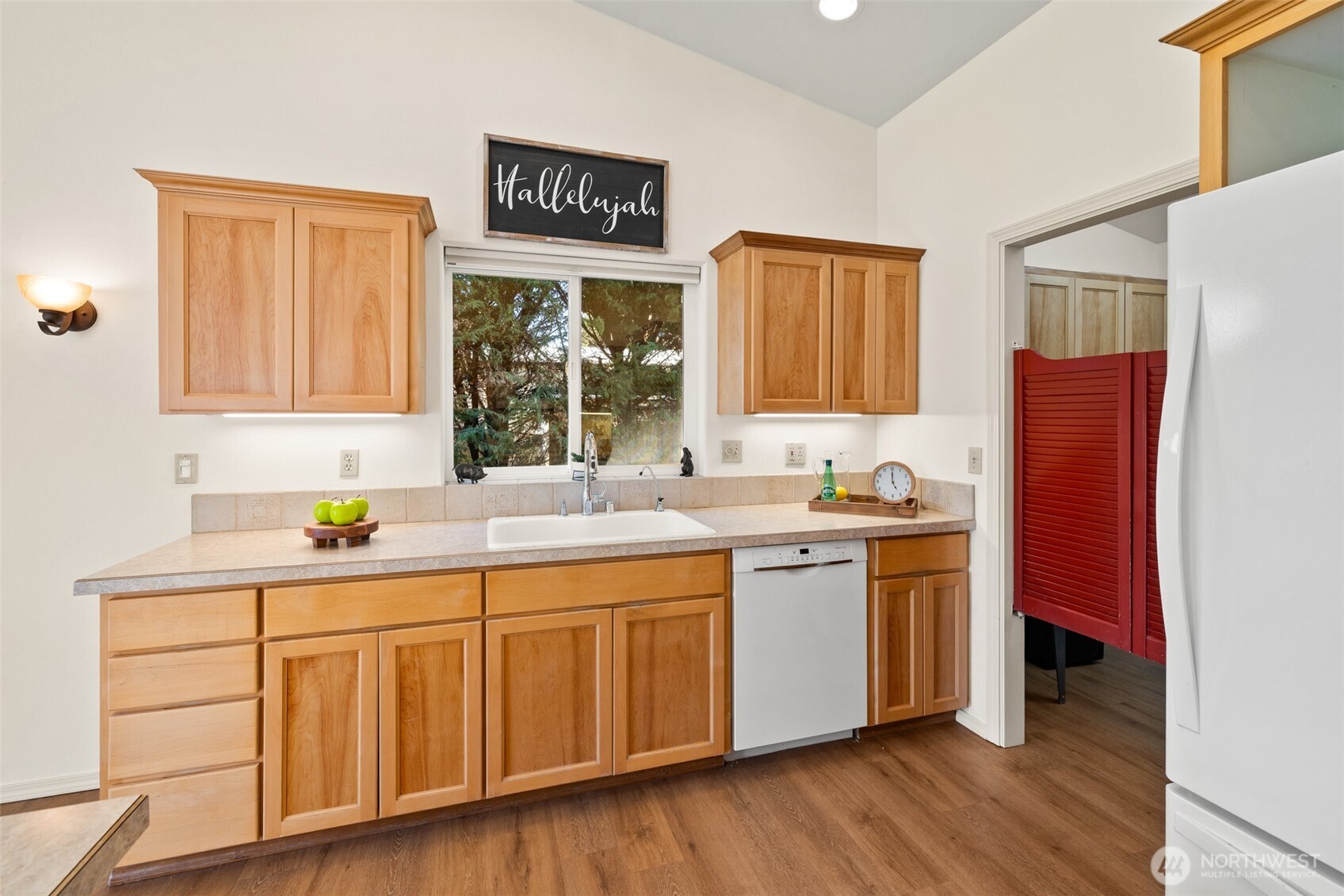 2042 Finn Hall Road Port Angeles, WA 98362 - Photo 14 of 40 a kitchen with a sink and cabinets