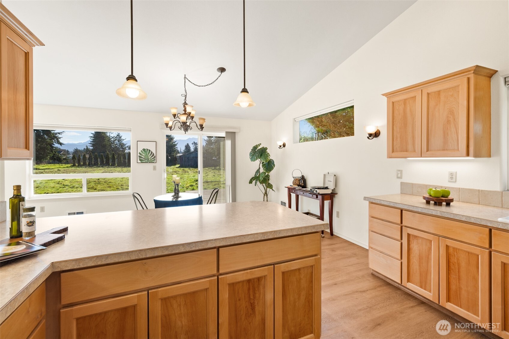 2042 Finn Hall Road Port Angeles, WA 98362 - Photo 15 of 40 a kitchen with a sink and cabinets