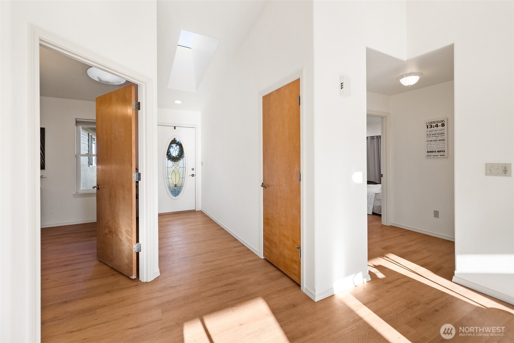 2042 Finn Hall Road Port Angeles, WA 98362 - Photo 16 of 40 a view of a hallway with wooden floor and entryway