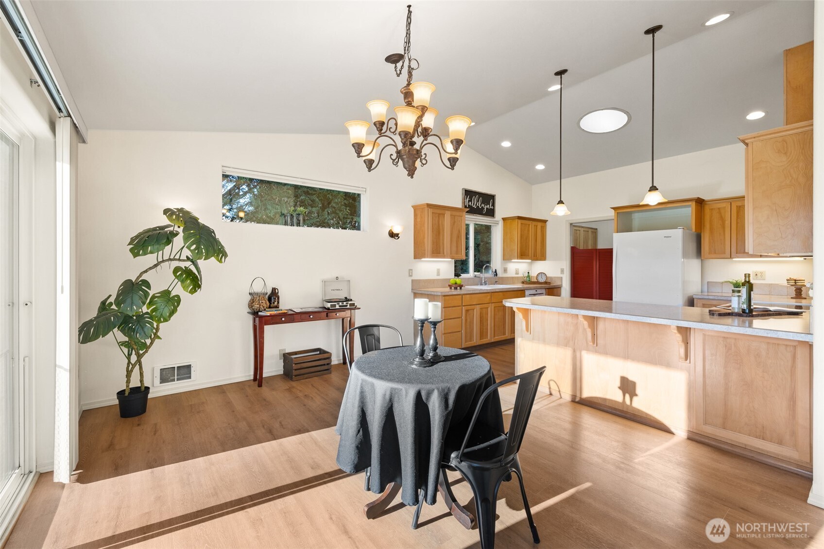 2042 Finn Hall Road Port Angeles, WA 98362 - Photo 18 of 40 a view of kitchen with dining area refrigerator and window