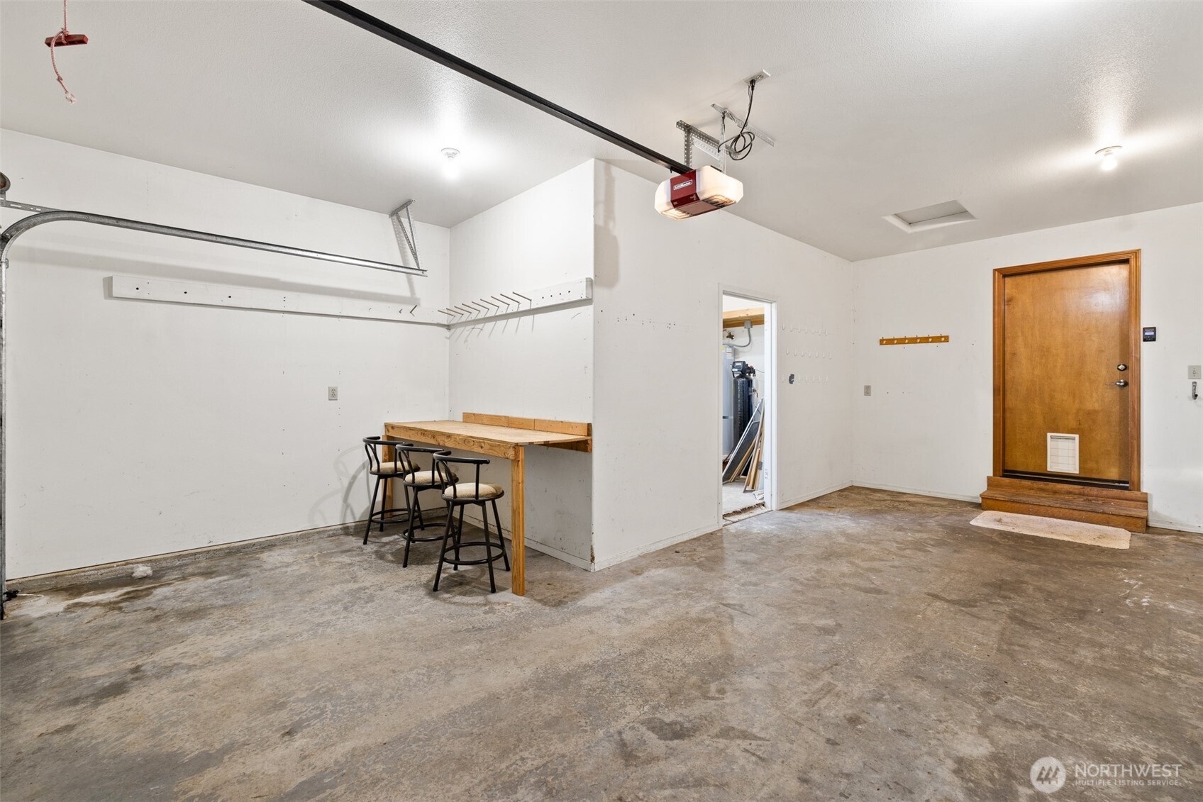 2042 Finn Hall Road Port Angeles, WA 98362 - Photo 28 of 40 a view of a room with table and chairs