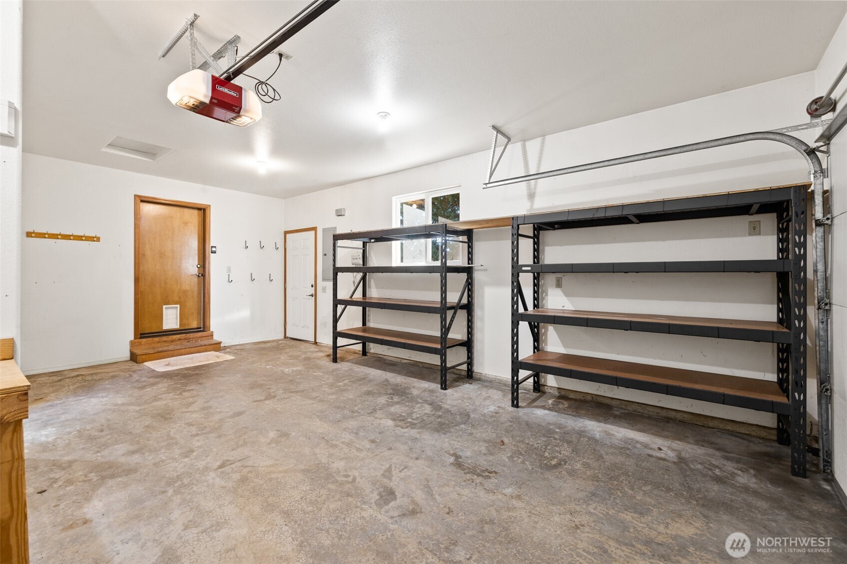 2042 Finn Hall Road Port Angeles, WA 98362 - Photo 29 of 40 a view of room with stairs and a ceiling fan