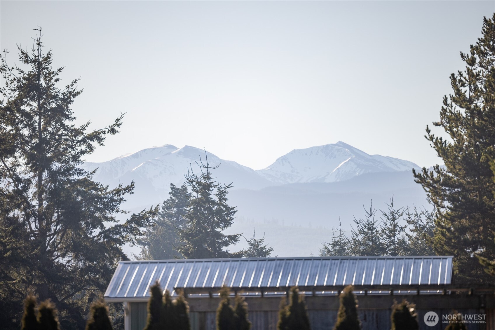 2042 Finn Hall Road Port Angeles, WA 98362 - Photo 32 of 40 a view of a roof deck with wooden fence and floor