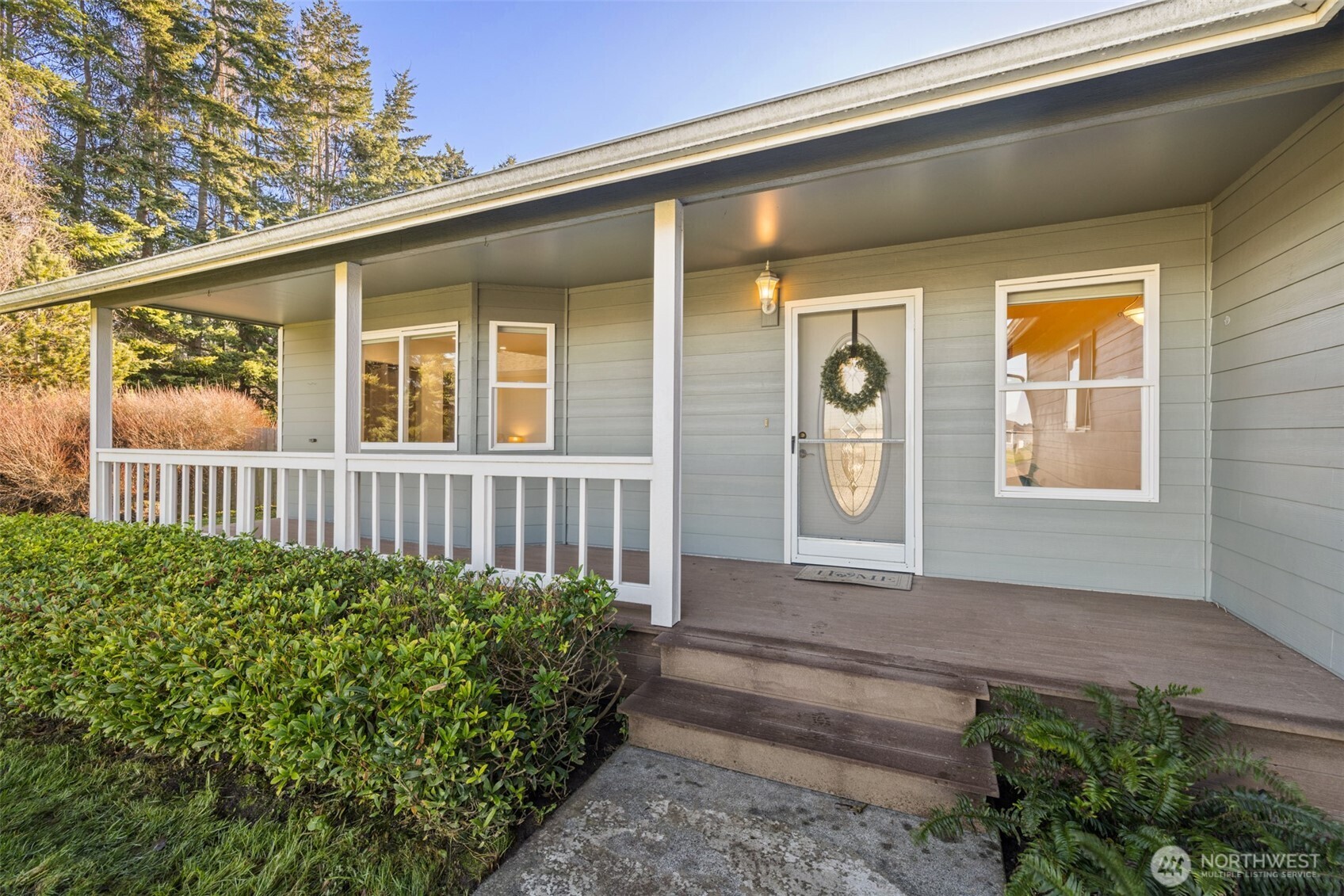 2042 Finn Hall Road Port Angeles, WA 98362 - Photo 5 of 40 a front view of a house with stairs