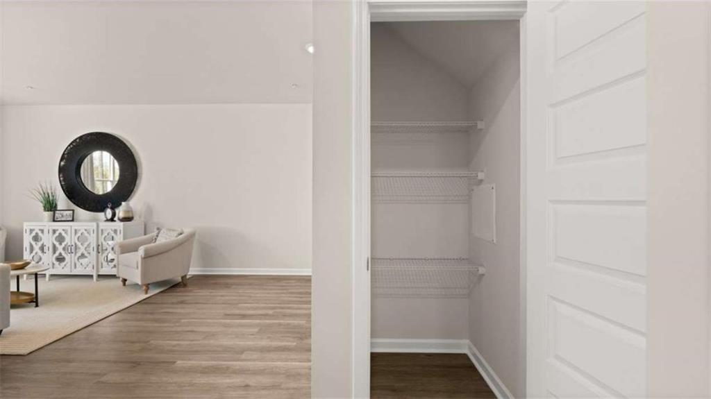 281 Sound Circle Stockbridge, GA 30281 - Photo 17 of 59 a living room with furniture and a window