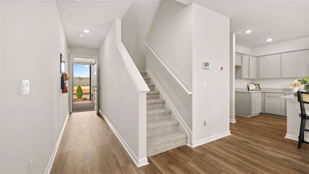 281 Sound Circle Stockbridge, GA 30281 - Photo 8 of 59 a view of a kitchen from the hallway