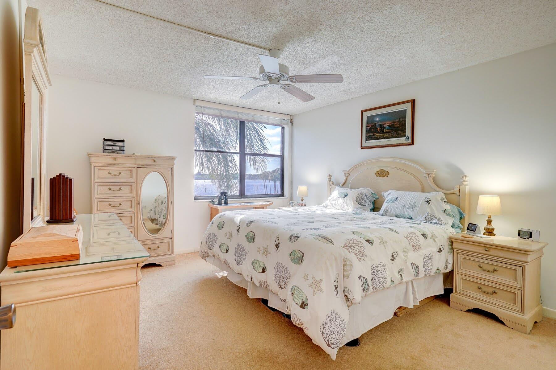 1950 Southwest Palm City Road, Unit 11301 Stuart, FL 34994 - Photo 19 of 57 Primary Bedroom