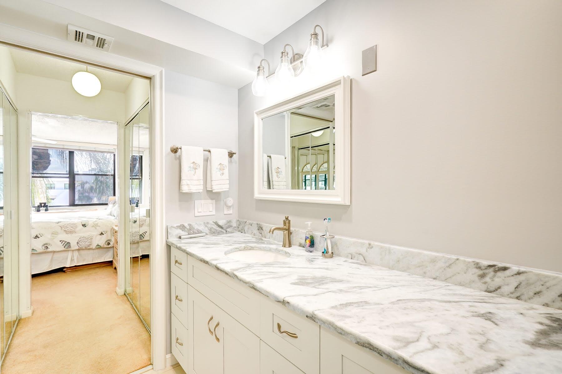 1950 Southwest Palm City Road, Unit 11301 Stuart, FL 34994 - Photo 23 of 57 Primary Bathroom