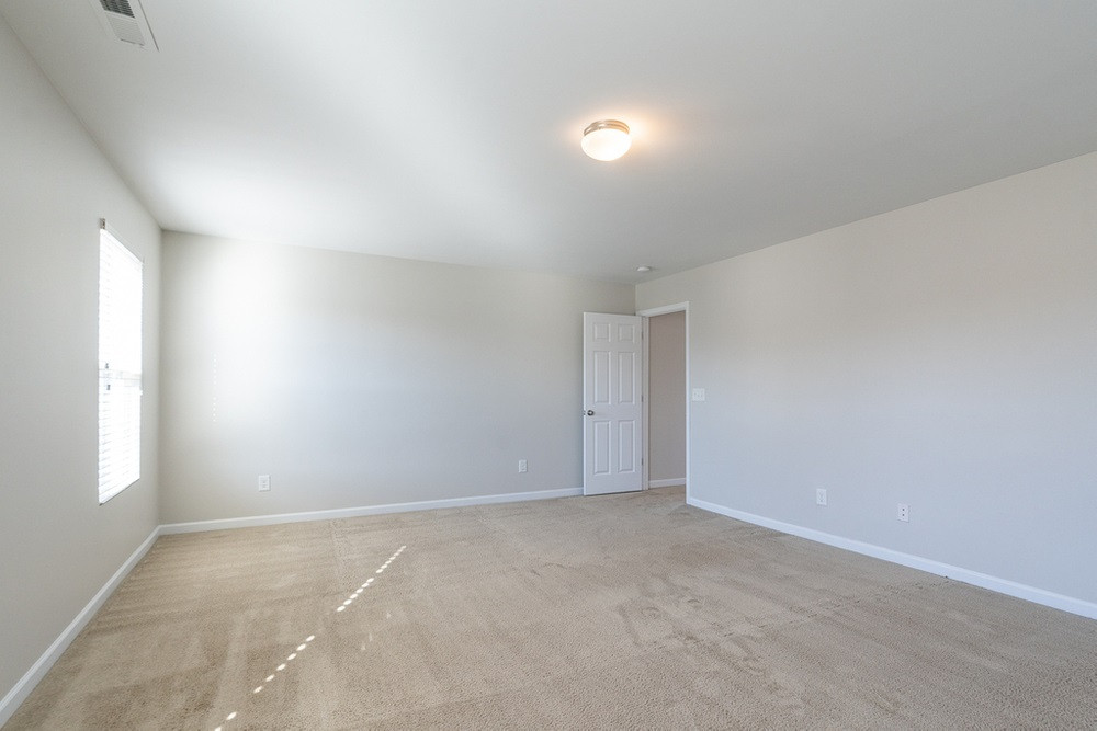 8014 McKee Drive Raleigh, NC 27616 - Photo 21 of 30 Primary Bedroom