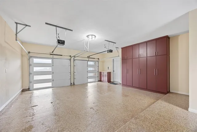 a view of a swimming pool with a yard