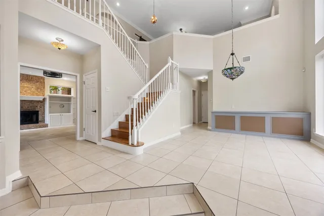 a view of entryway and hall with a front door