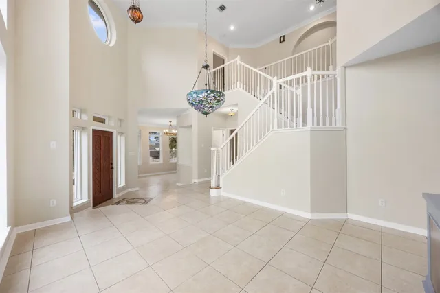 a view of entryway and hall with a window